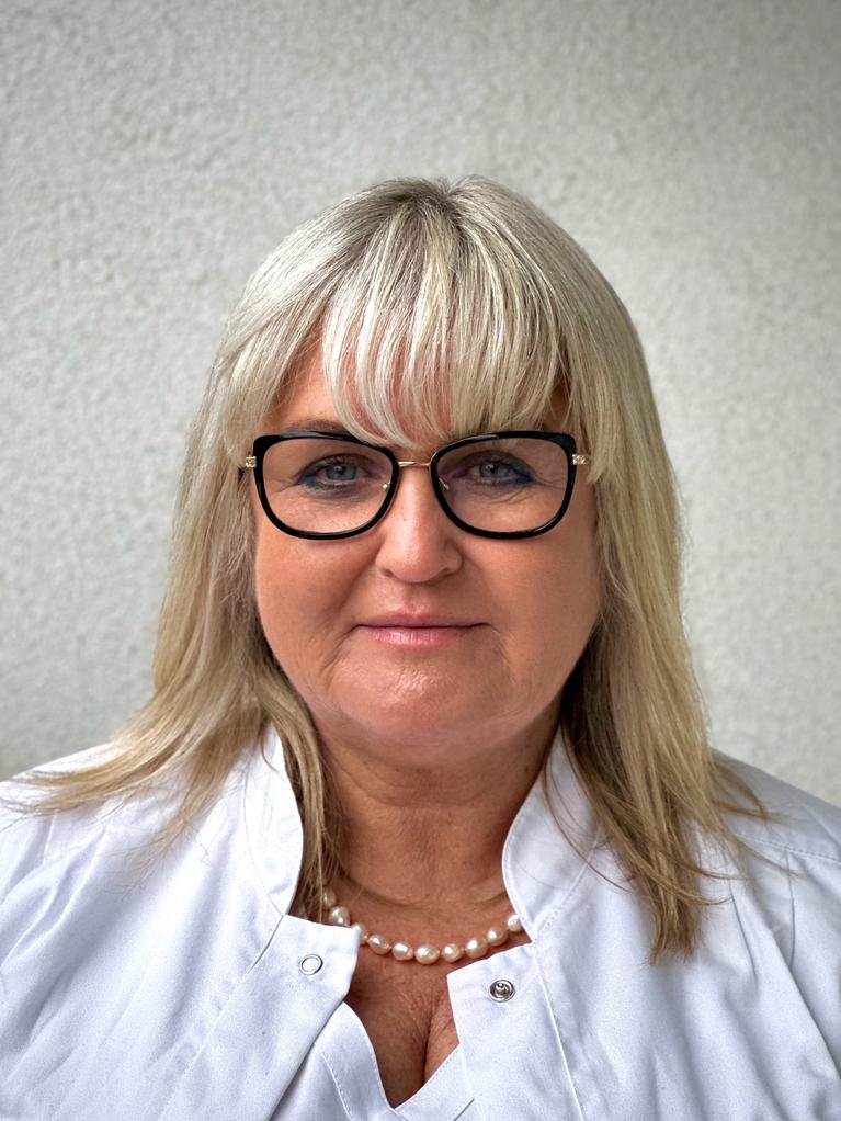 MUDr. Komrsová